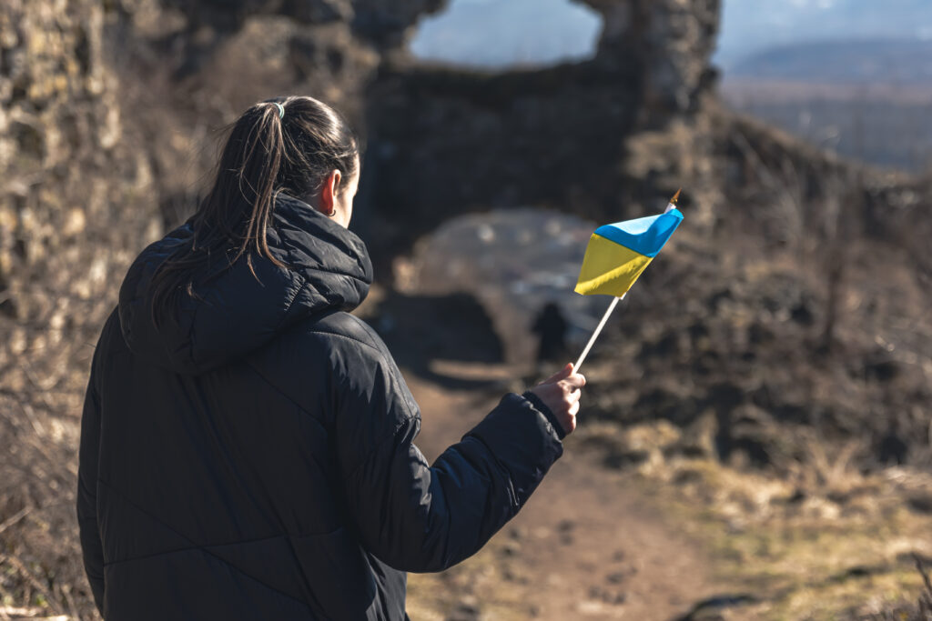 A young woman with the flag of ukraine in her hand 2023 11 27 05 13 38 utc